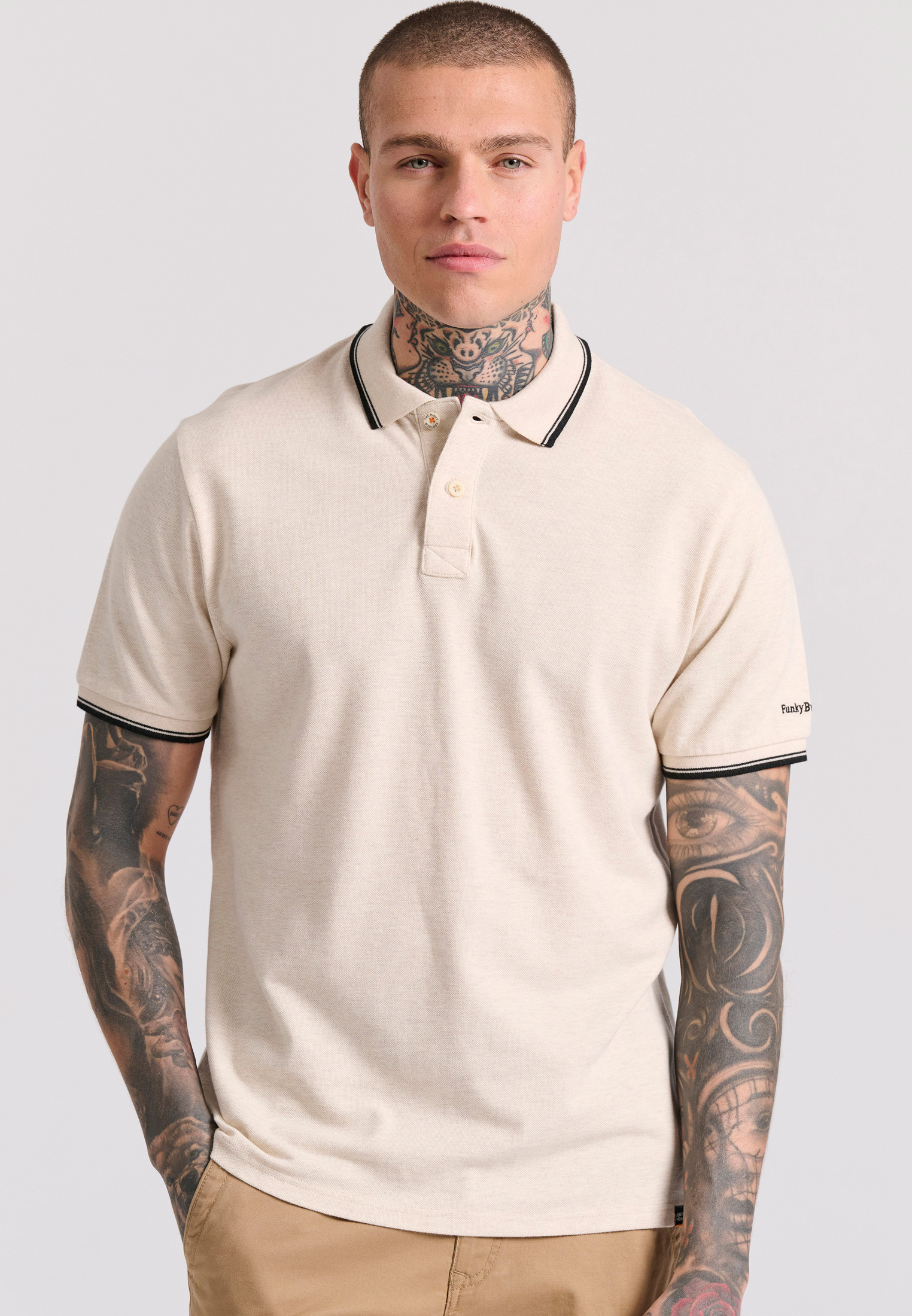 Μπλούζα polo σε μελανζέ ύφασμα – €19.47 | FunkyBuddha